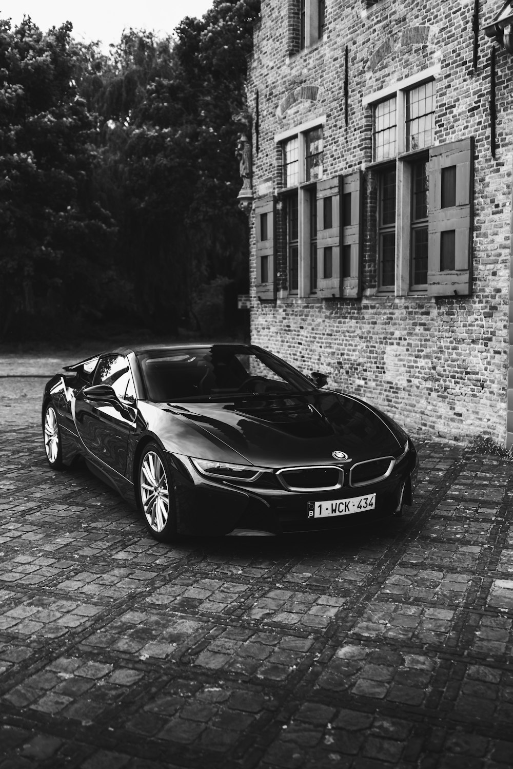 greyscale photography of BMW coupe