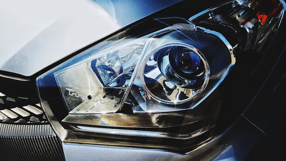 close up photography of vehicle headlight