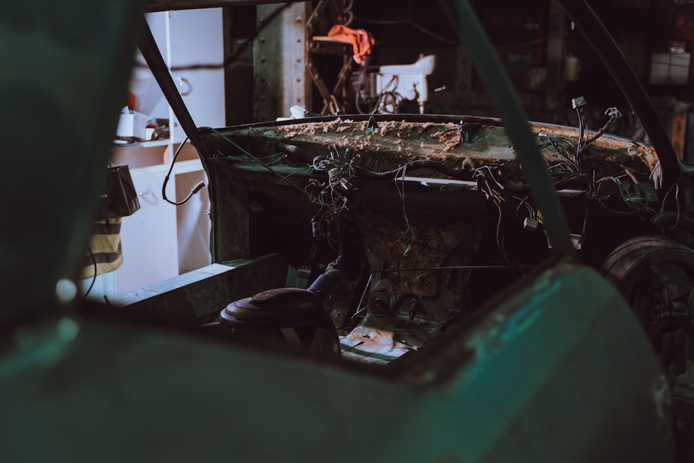 person fixing unfinished car