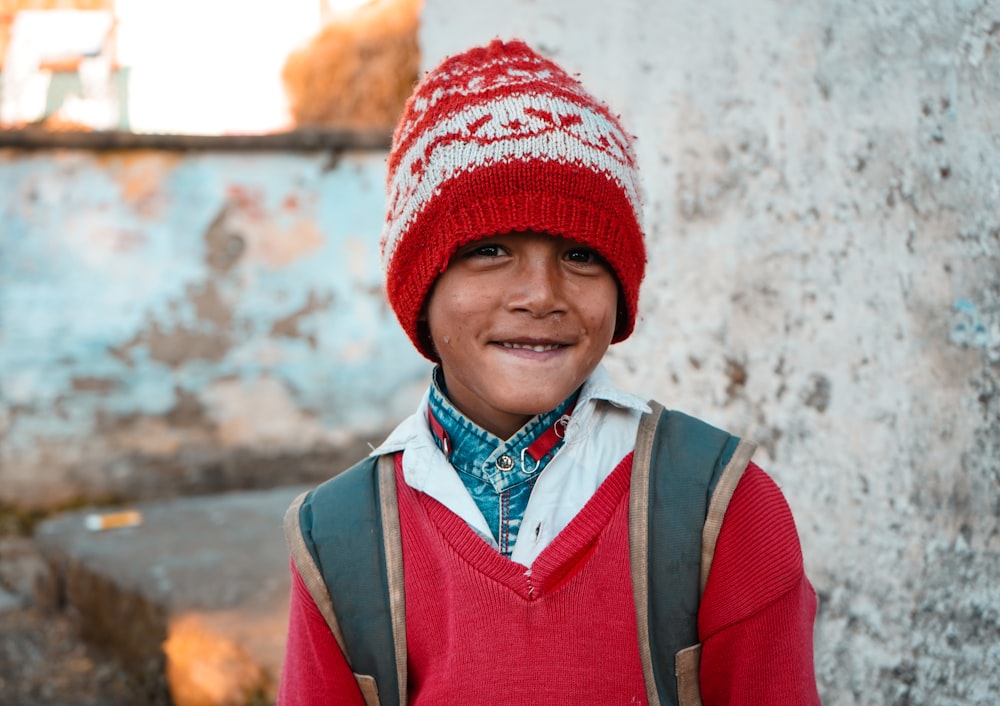 boy smiling and looking at the camera