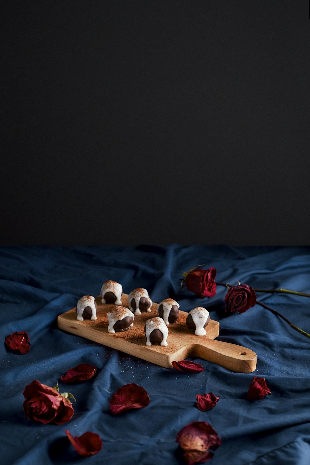 s'mores on wooden panel with handle
