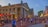 A bustling outdoor scene with numerous people walking or standing around a historic market building with columns. The building, called Quincy Market, has a classic architectural style. Red umbrellas and lights adorn an outdoor dining area where people are sitting. The street is paved with brick, adding a historic charm to the area. Signs for nearby businesses are visible, and trees and cityscape can be seen in the background.