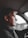 man driving a car
