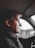 man driving a car