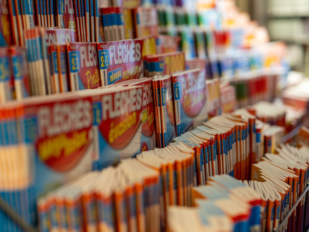 Fleches books displayed on rack