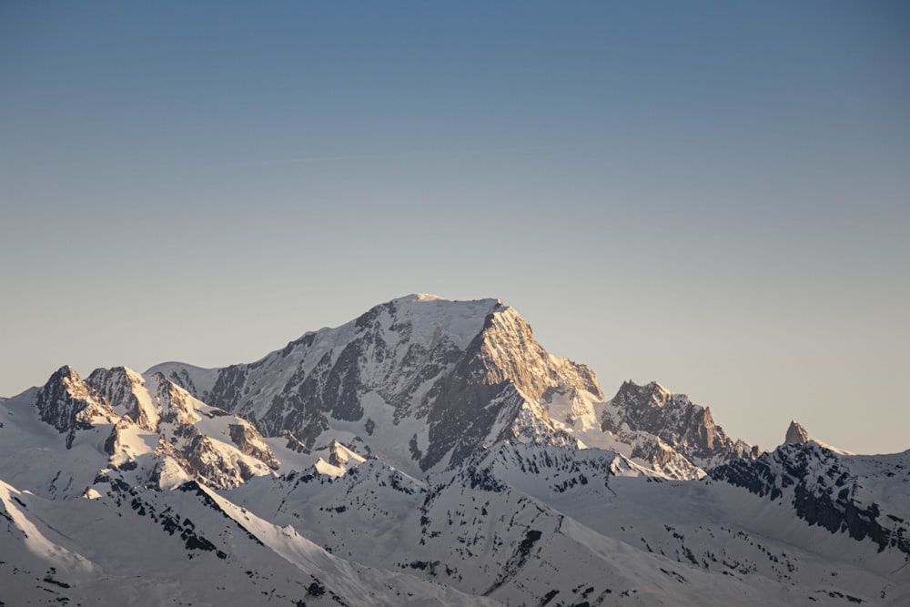 snow covered mountain during daytime