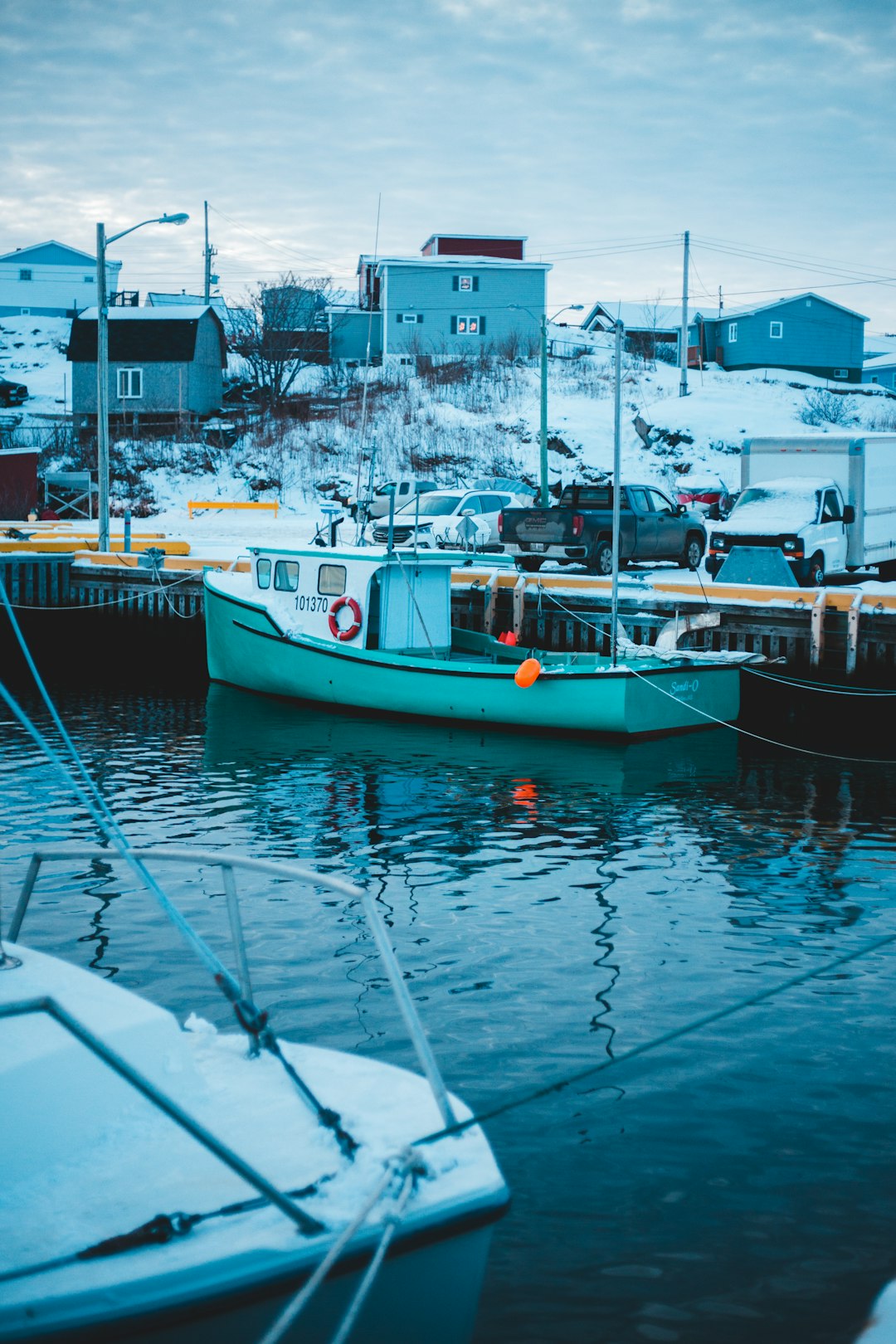 shallow focus photo of white boat on body of water