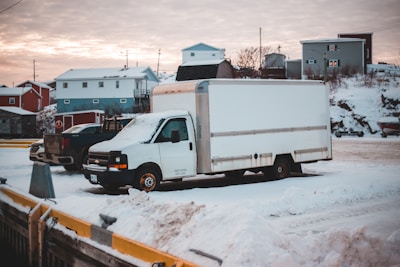 white box truck in a parking lot