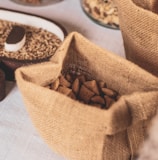 shallow focus photo of brown sack on white surface