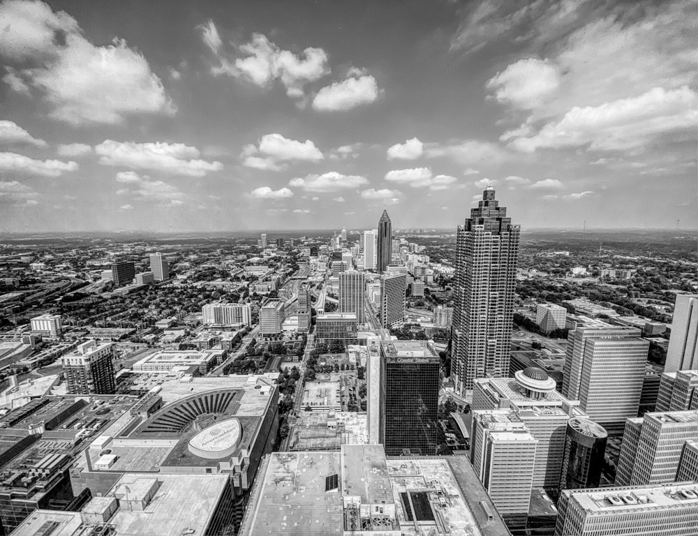 grayscale photo of city buildings