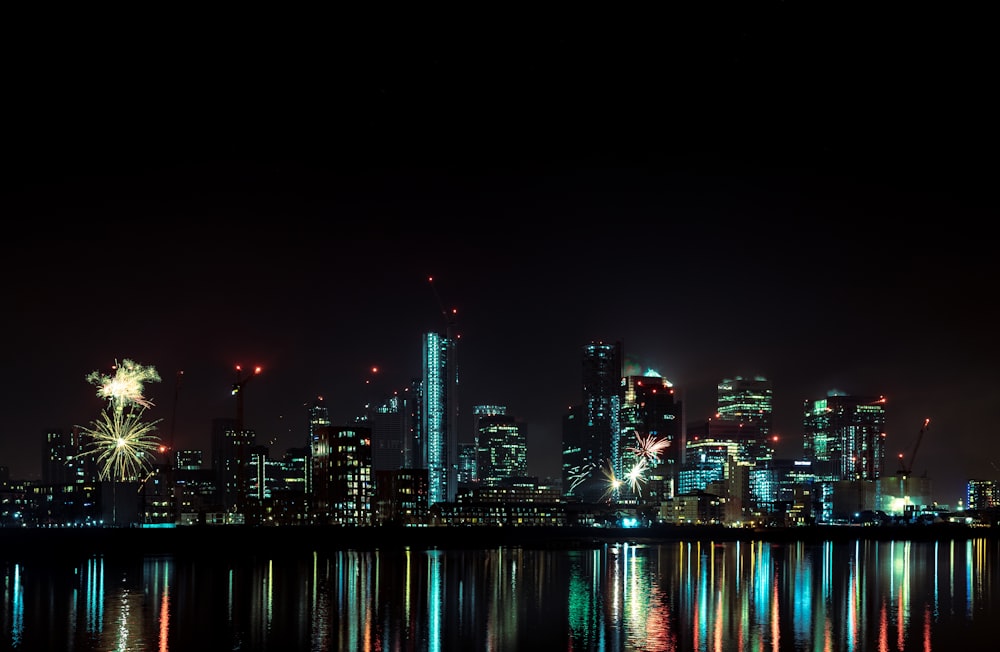 lighted city buildings during nighttime