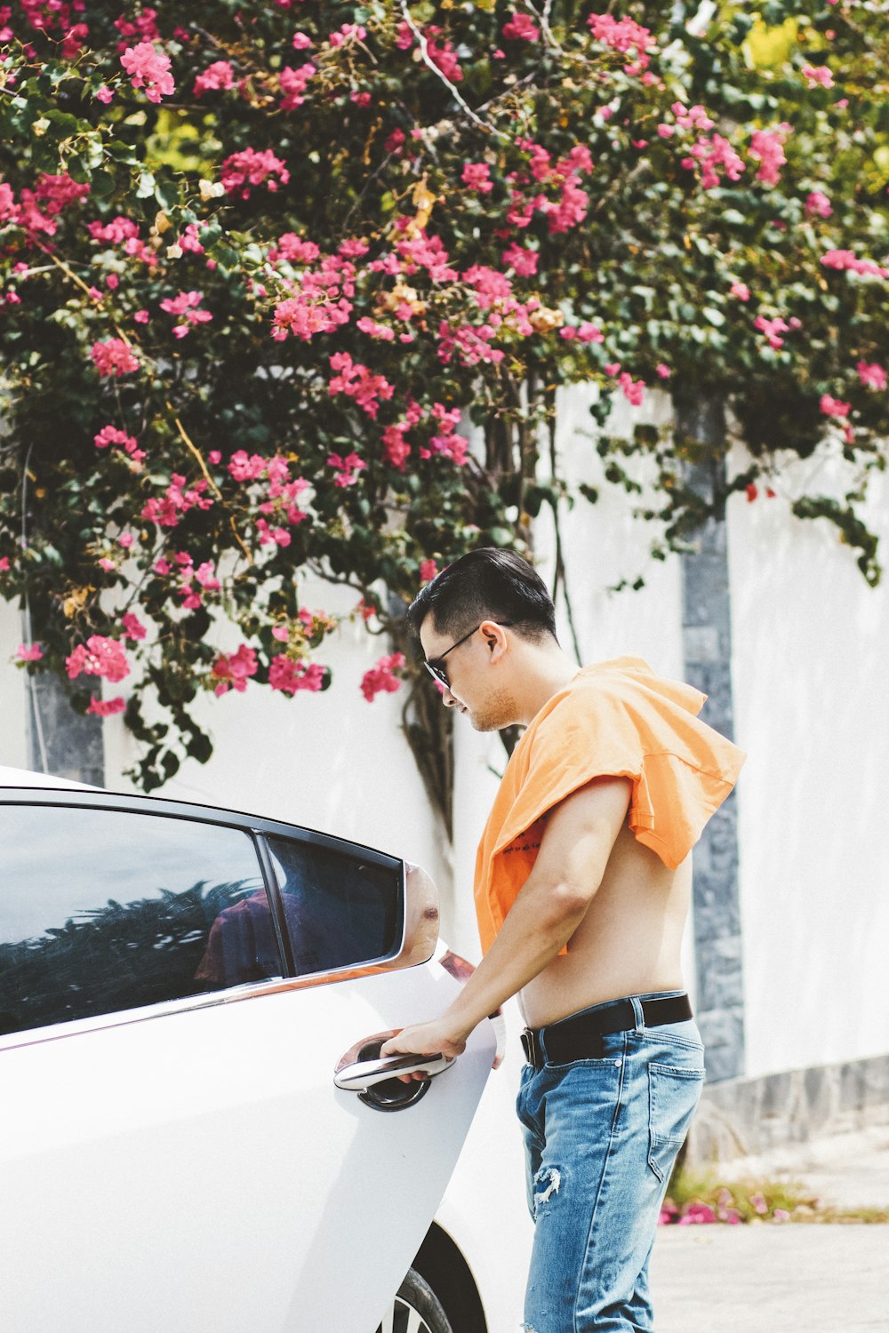 man holding vehicle door