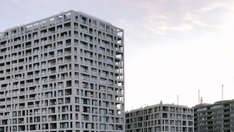 A panoramic view of a modern residential development in Aleppo, highlighting clean lines and structural precision.