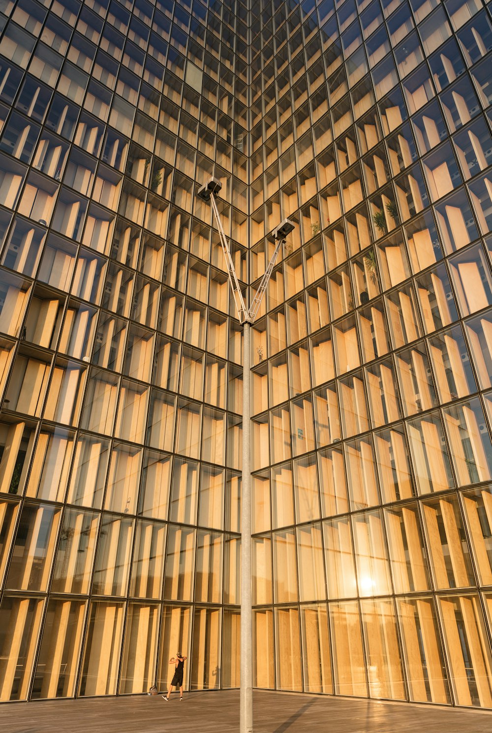 lamp post in front of building during daytime