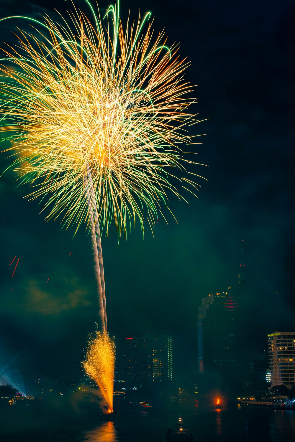 yellow fireworks at night