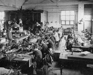 a group of people working in a factory