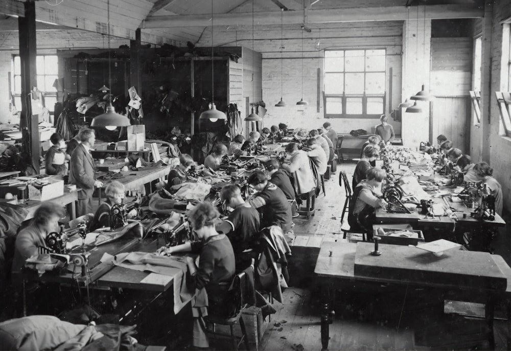 a group of people working in a factory