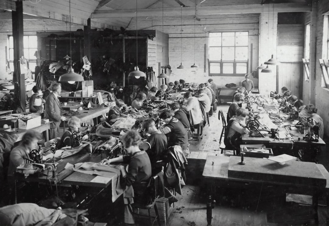 a group of people working in a factory, Simpson