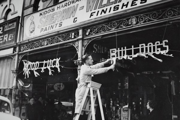 Someone working in a store circa 1954