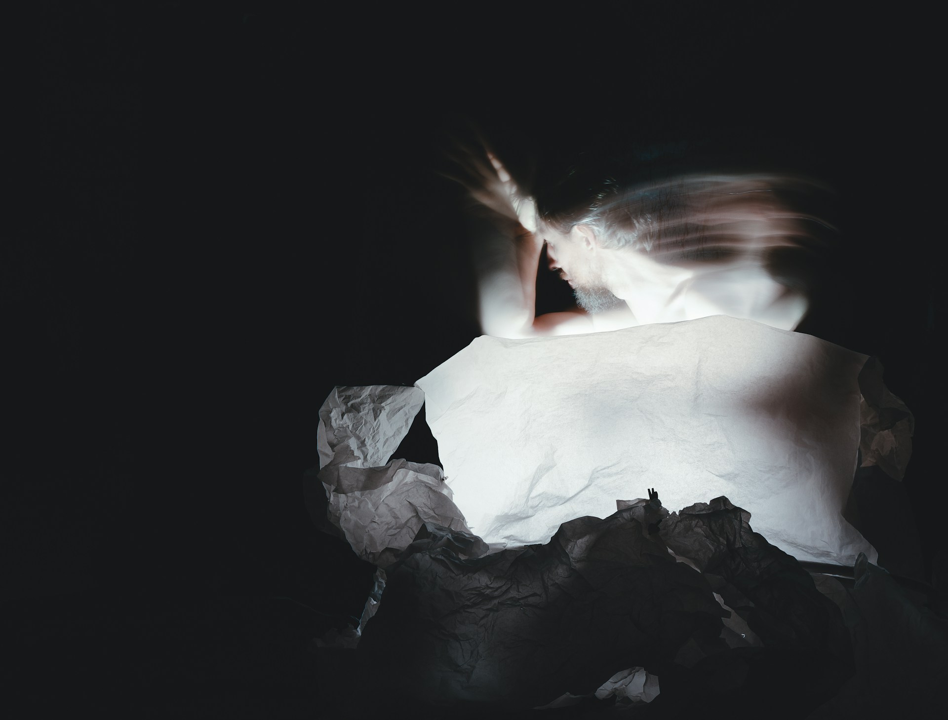 A dynamic composition featuring a writer in motion, surrounded by notebooks, symbols of reflection and imagination.