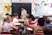woman standing in front of children