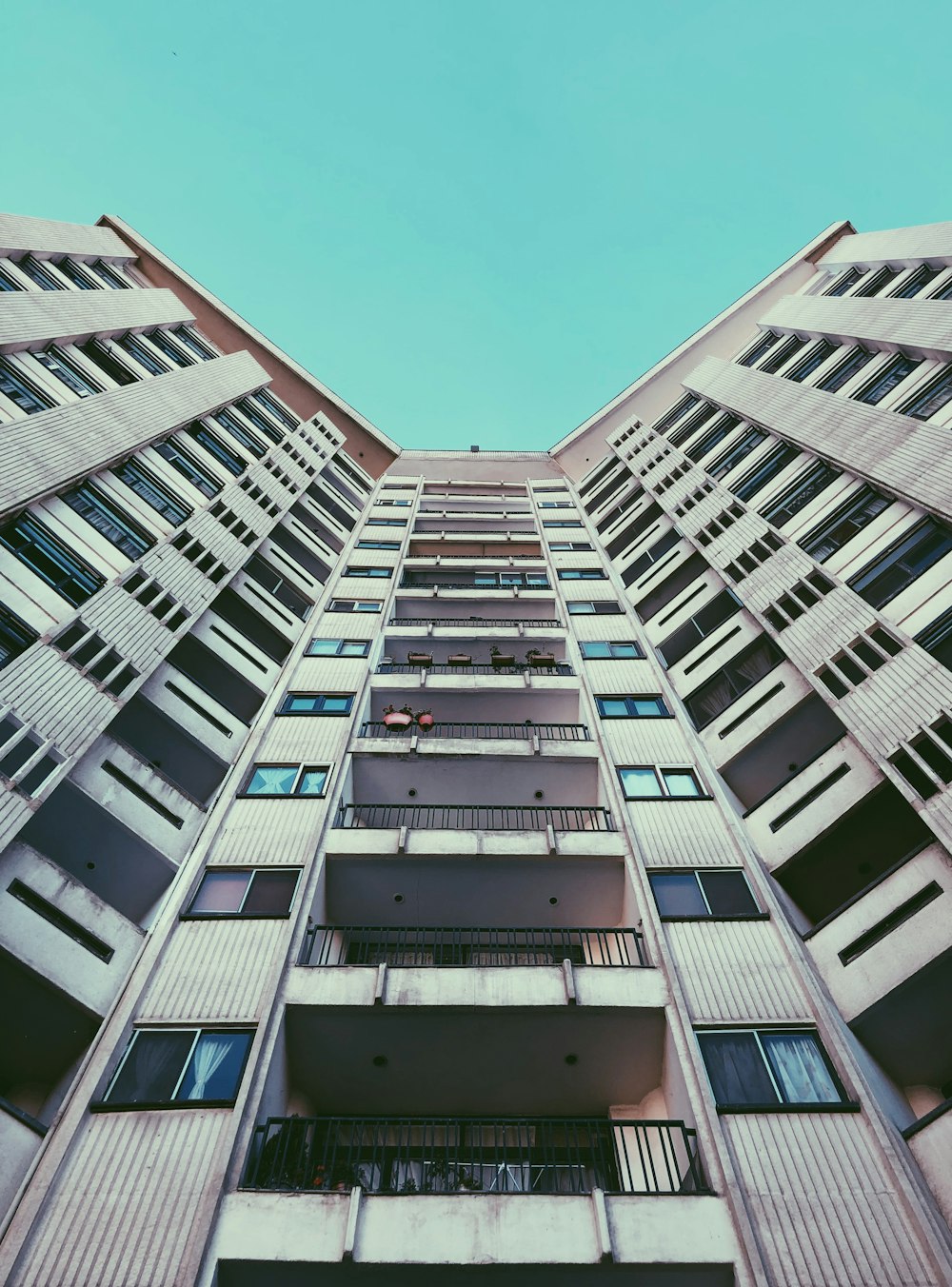 high-rise building with balconies during day