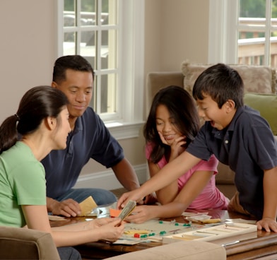 group of people beside coffee table