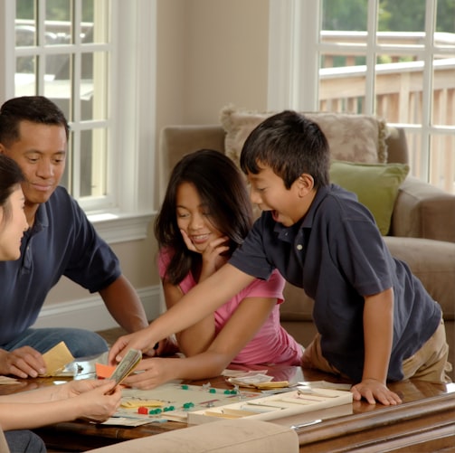 group of people beside coffee table