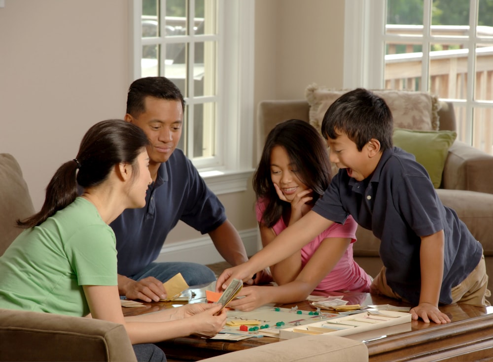 group of people beside coffee table