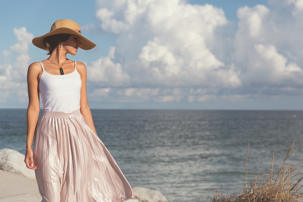 woman walking near body of water