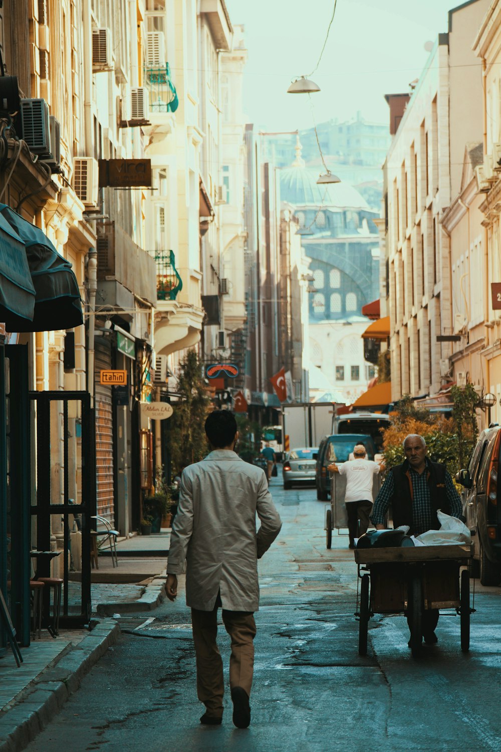 few people walking on street near buildings during daytime