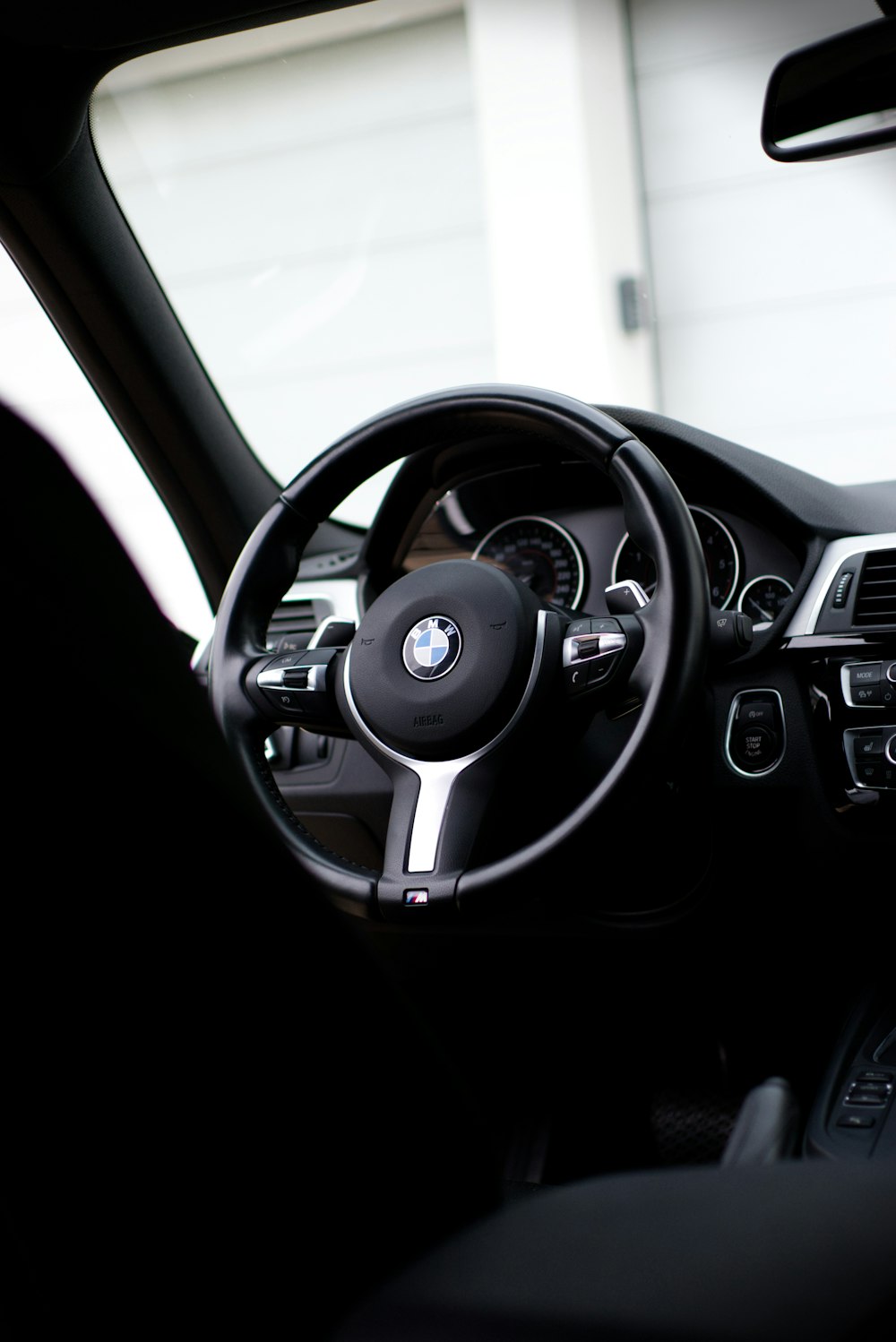 black BMW steering wheel