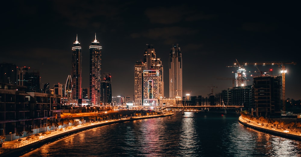 city with high-rise buildings during night time