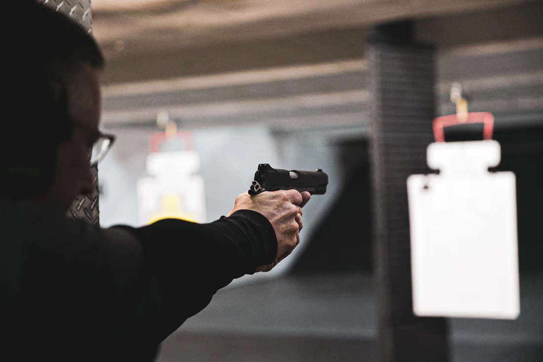 Muzzle downrange, finger off the trigger until on target.