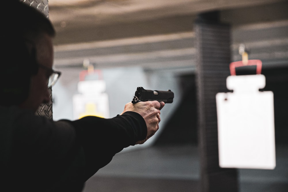 man doing practice shooting