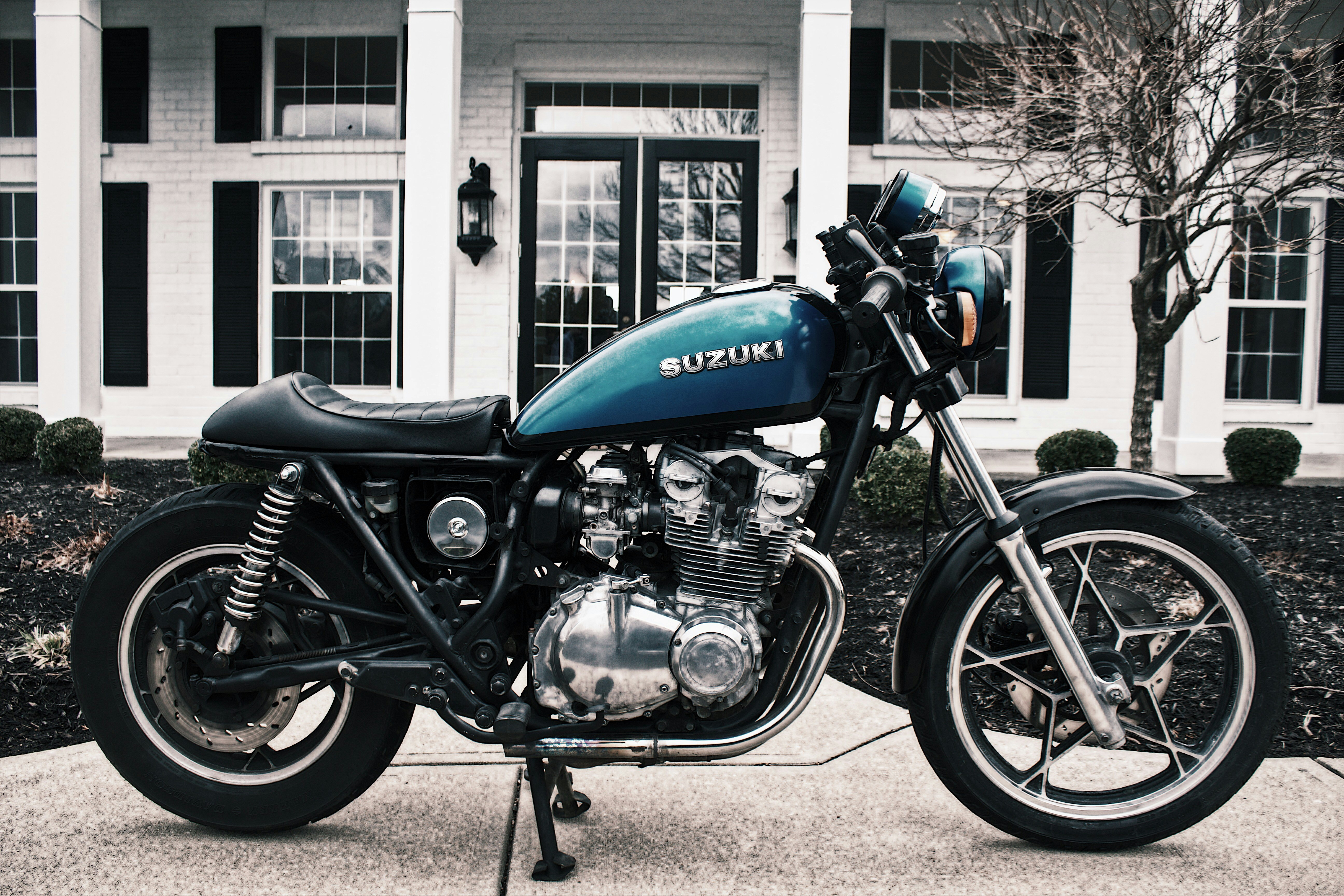 blue and black Suzuki motorcycle