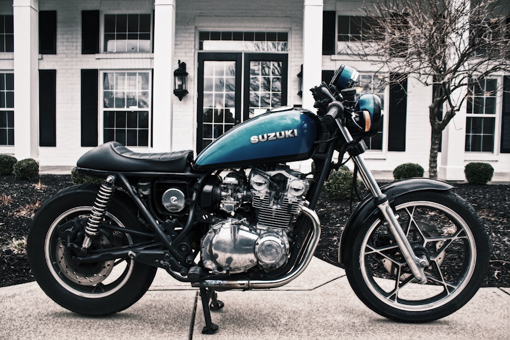 blue and black Suzuki motorcycle