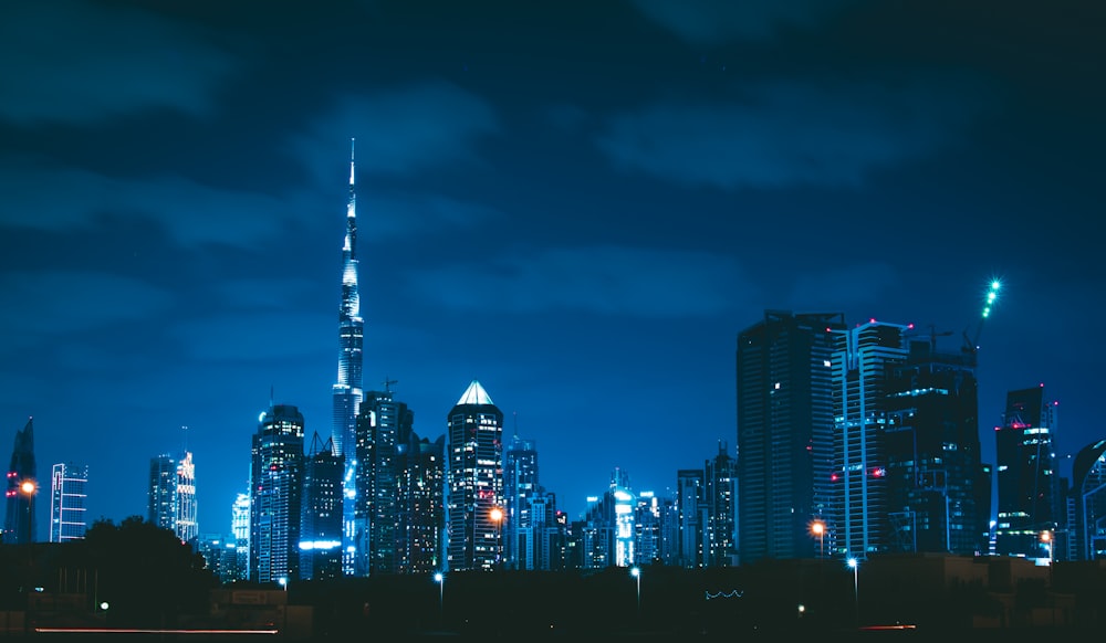 city with high-rise buildings during night time