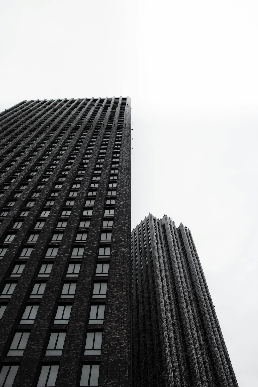 two black high-rise buildings