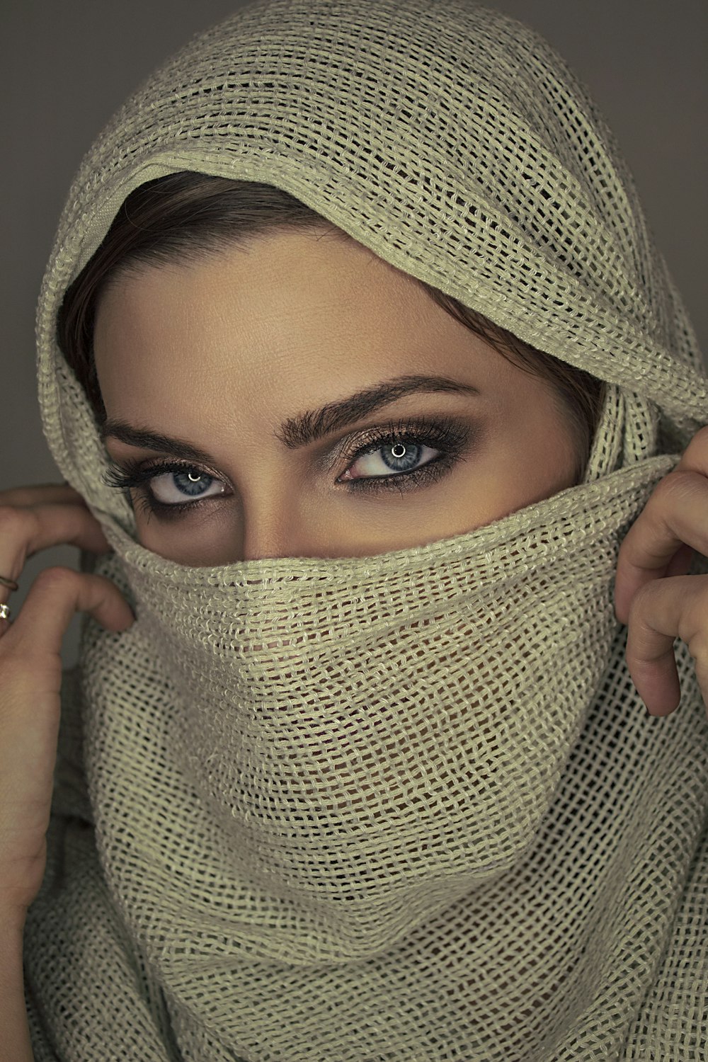 woman wearing beige hijab headscarf