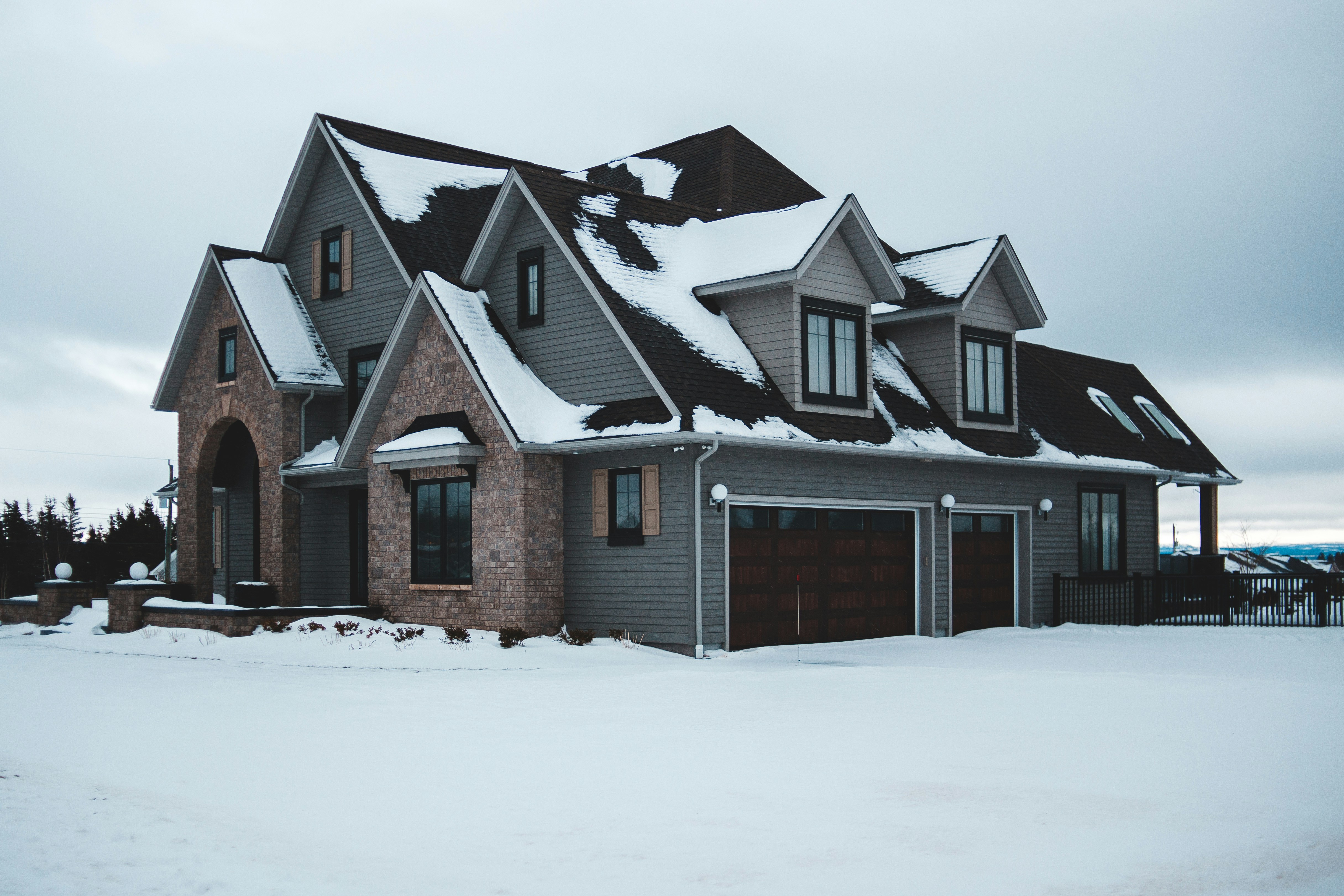 Gray house with garage photo Free Kippens Image on Unsplash
