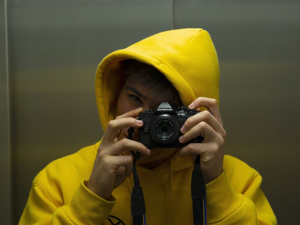 person holding a camera