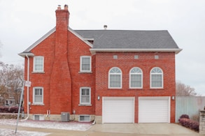 brown and white 2-storey house