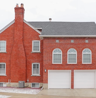 brown and white 2-storey house