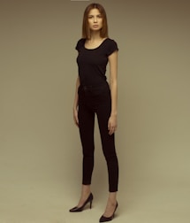 A stylish outfit laid out on a dark, elegant background symbolizing confidence and self-esteem.