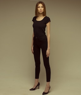 A stylish outfit laid out on a dark, elegant background symbolizing confidence and self-esteem.
