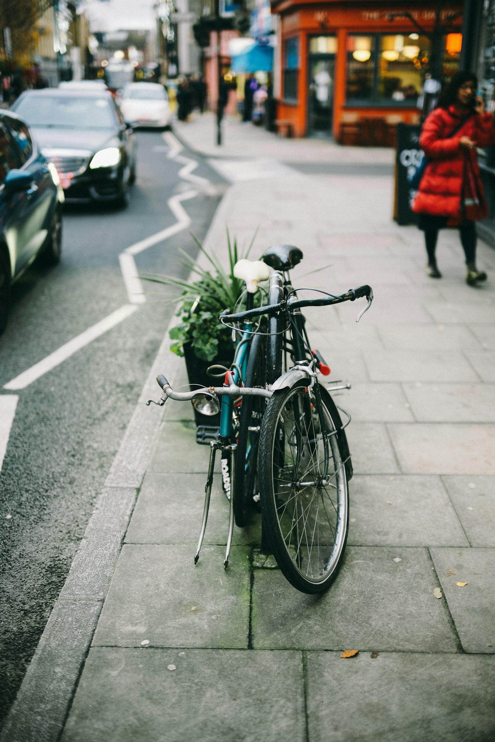 Leica M10 sample photo. Black bike on sidewalk photography