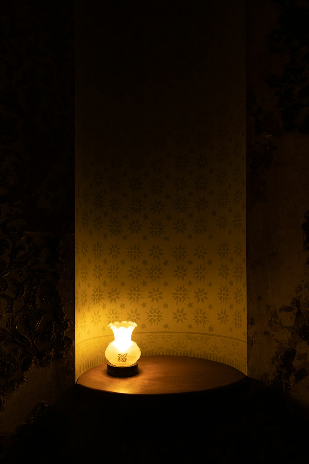 turned-on table lamp