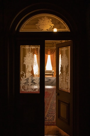 A cozy living room featuring a stunning refinished door, enhancing the home's aesthetic appeal.