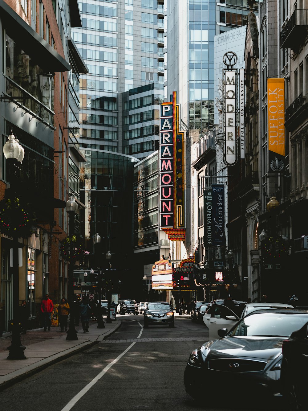 a city street filled with lots of tall buildings